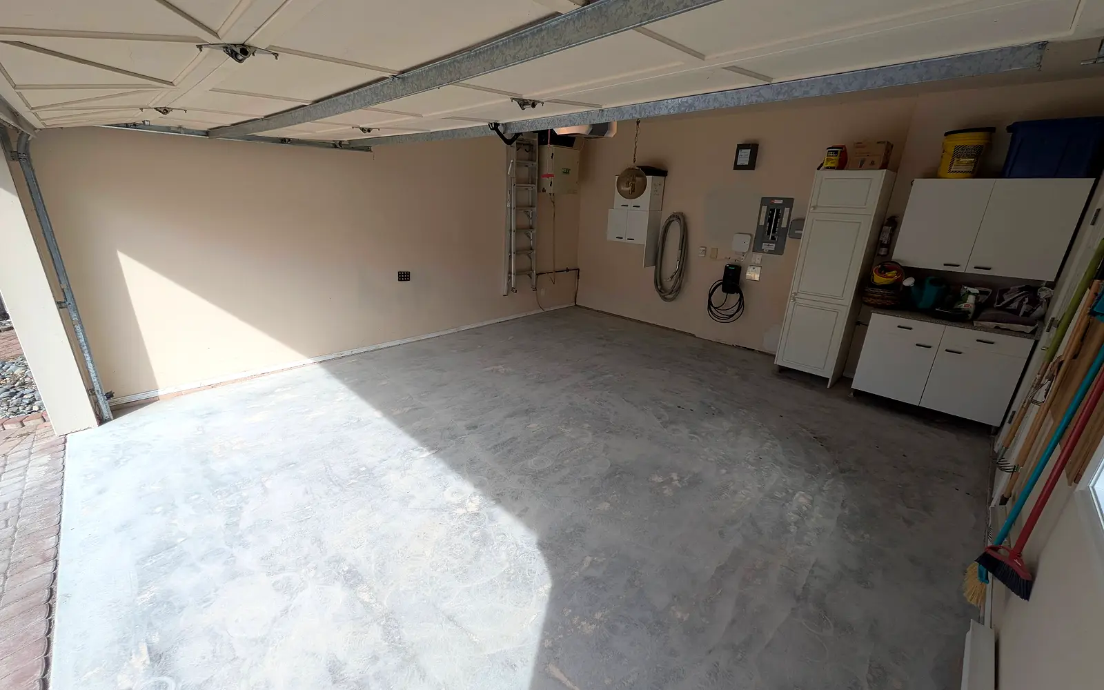 Same garage floor before coating, bare ground concrete